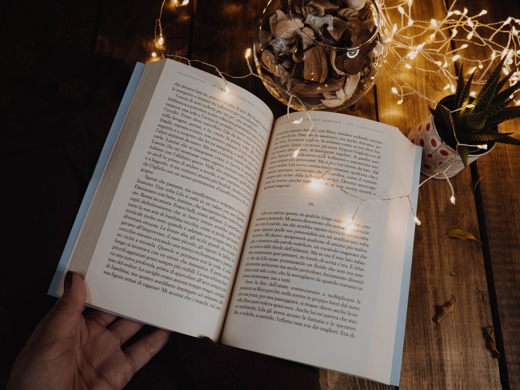 hand with an open book