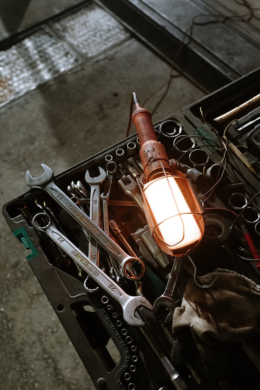 red and silver metal tool