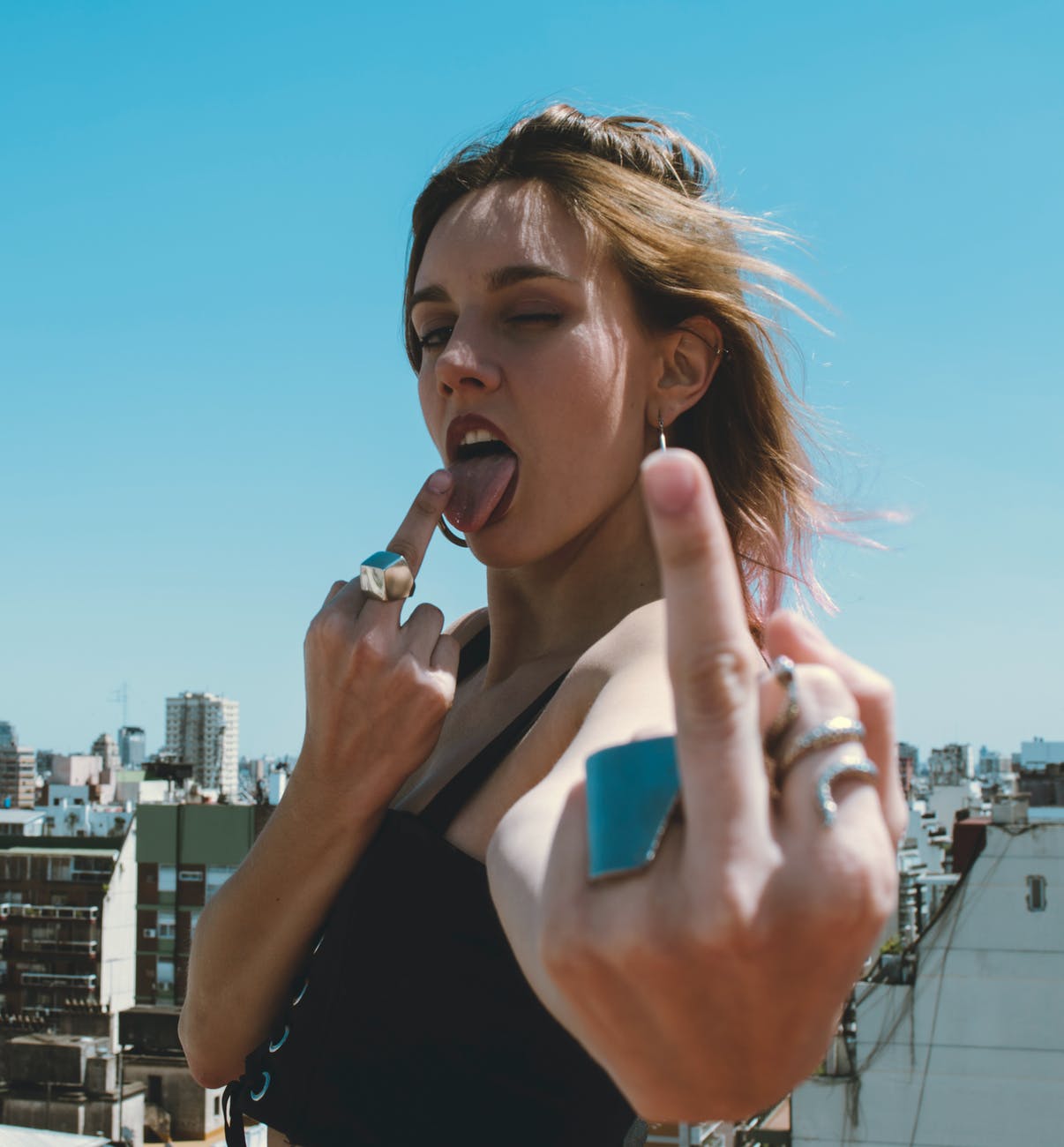 woman making hand sign