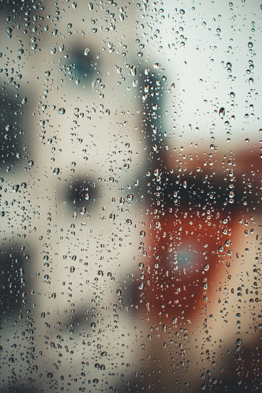 abstract background with raindrops on misted glass
